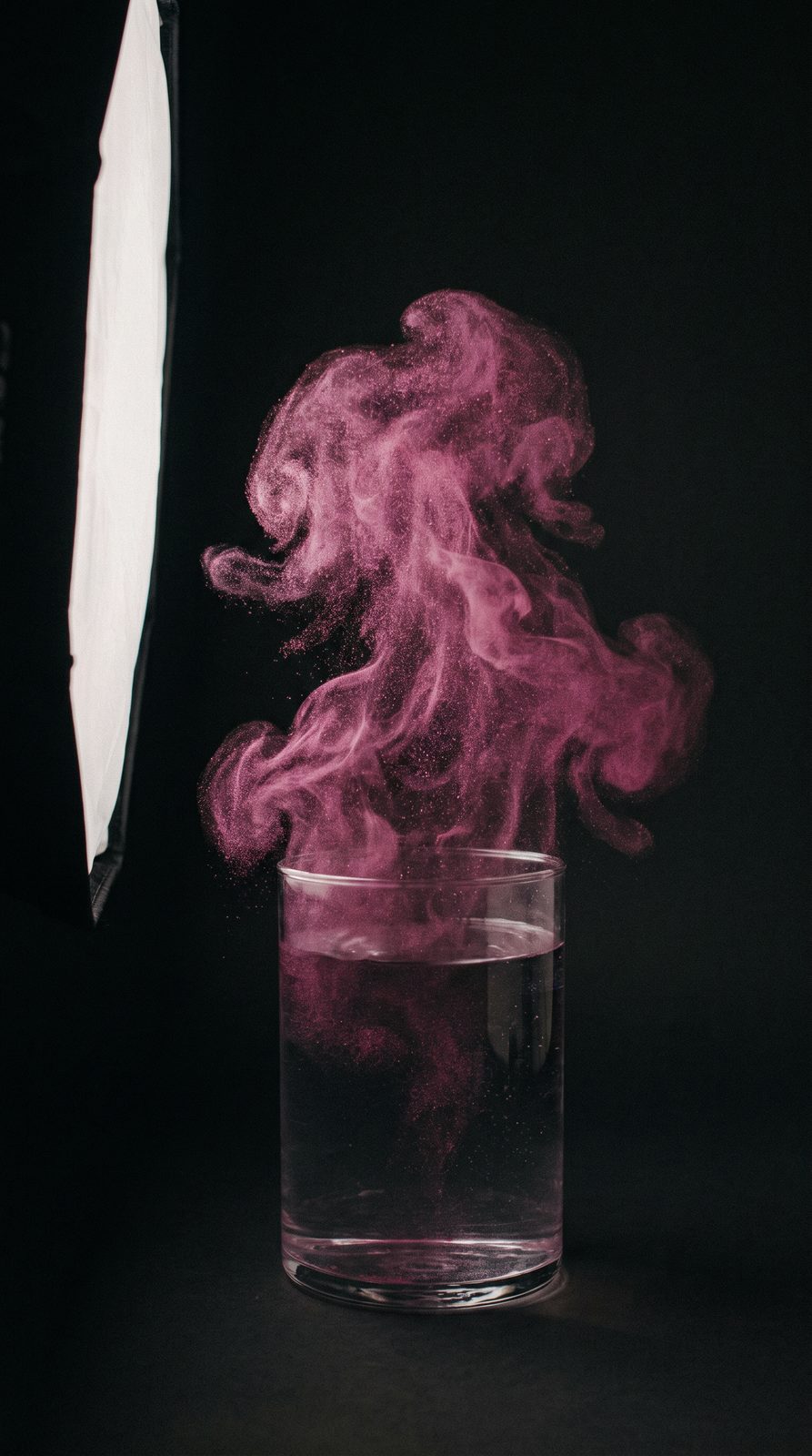 Pink Particles in Suspension
